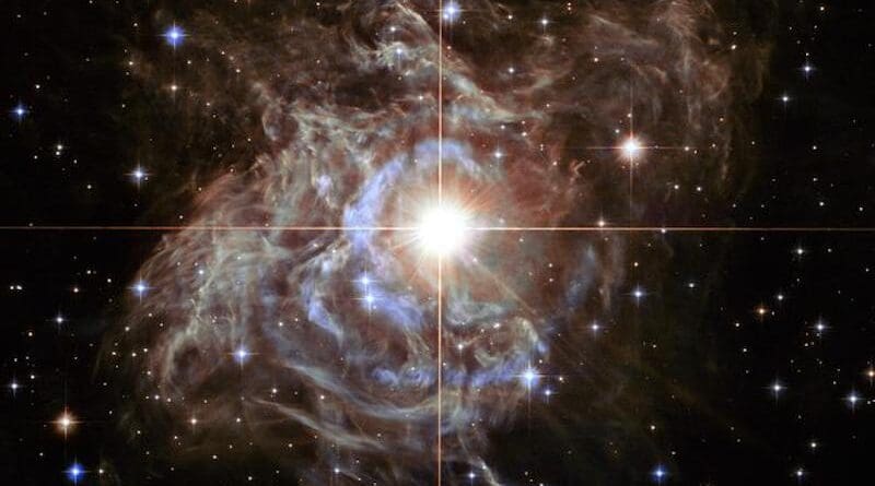 RS Puppis, one of the most luminous Cepheid variable stars, rhythmically brightens and dims over a six-week cycle. CREDIT: NASA, ESA, Hubble Heritage Team (STScI/AURA)-Hubble/Europe Collaboration