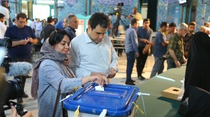 Iranians voting in election. Photo Credit: Tasnim News Agency