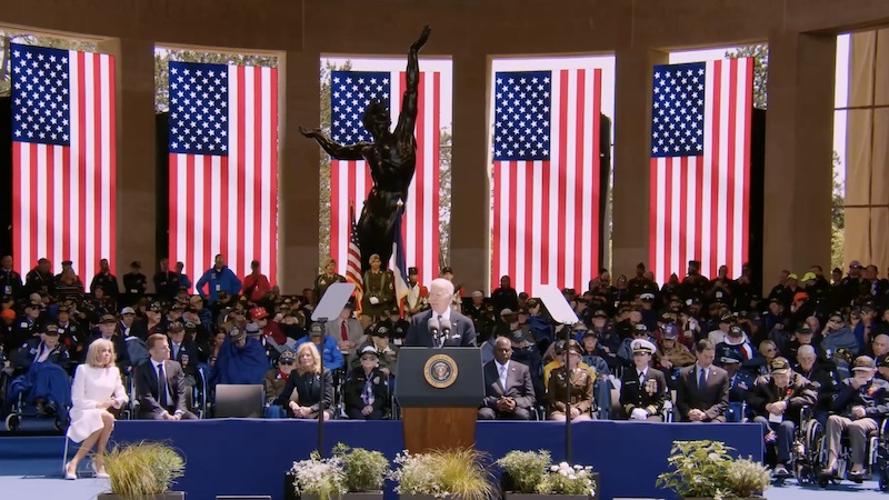 President Joe Biden delivers a speech during a commemorative ceremony to mark D-Day 80th anniversary, June 6, 2024, at the U.S. cemetery in Colleville-sur-Mer, Normandy, France. Photo Credit: White House video screenshot