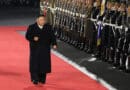 North Korea's leader Kim Jong Un inspecting the KPA Guard of Honour during military parade. Photo Credit: uriminzokkiri.com, Wikimedia Commons