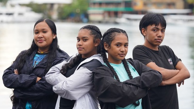 From left, Urulei King, Imaim Ngiraboi, Kelau Singeo and Seth Basilius on Nov. 27, 2024 in Koror. Ngiraboi and Singeo were part of a group of seven high school students who filed a submission to the U.N. over U.S. militarization of Palau. Photo Credit: Harry Pearl/BenarNews